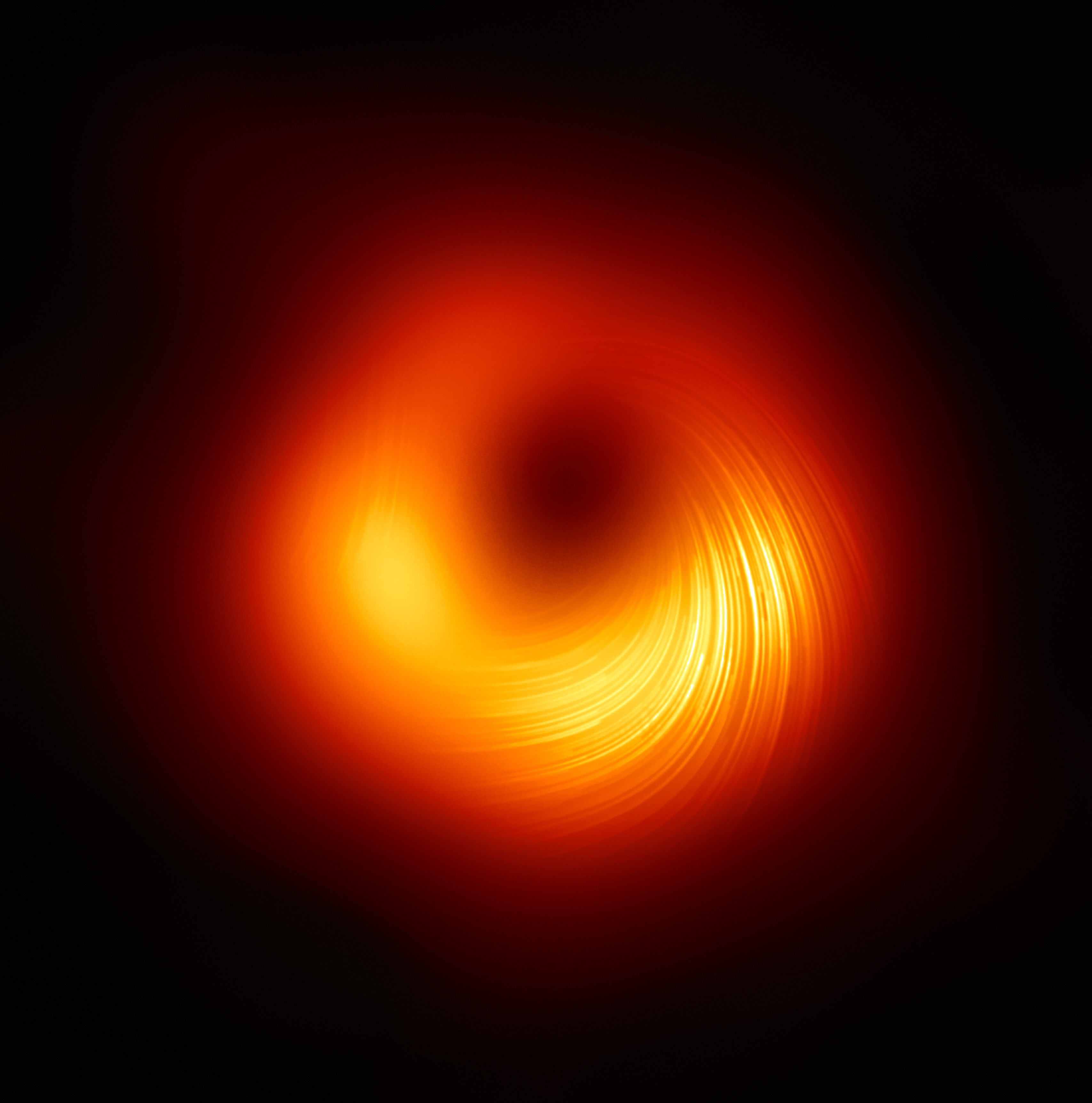 M87* super massive black hole shadow and magnetic field lines in the surrounding plasma.
